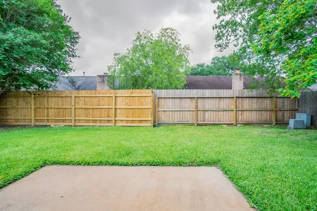 a view of a backyard with a garden