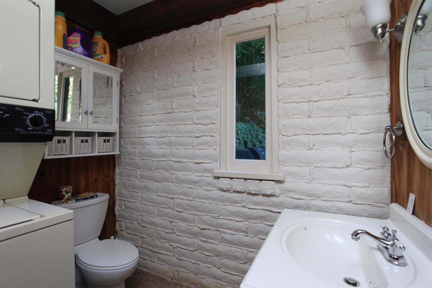 12093 Galice Road Merlin, OR 97532 - Photo 20 of 26 a bathroom with a sink a toilet and shower