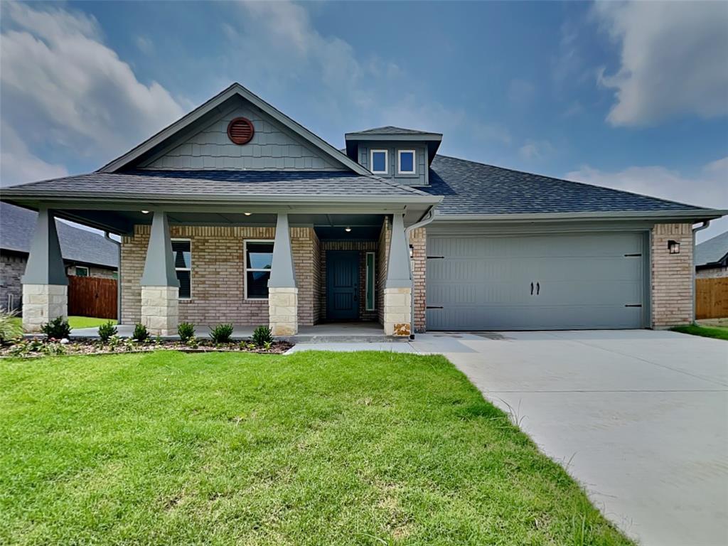 2108 Gabriel Drive Sherman, TX 75092 - Photo 1 of 16 a front view of a house with a yard