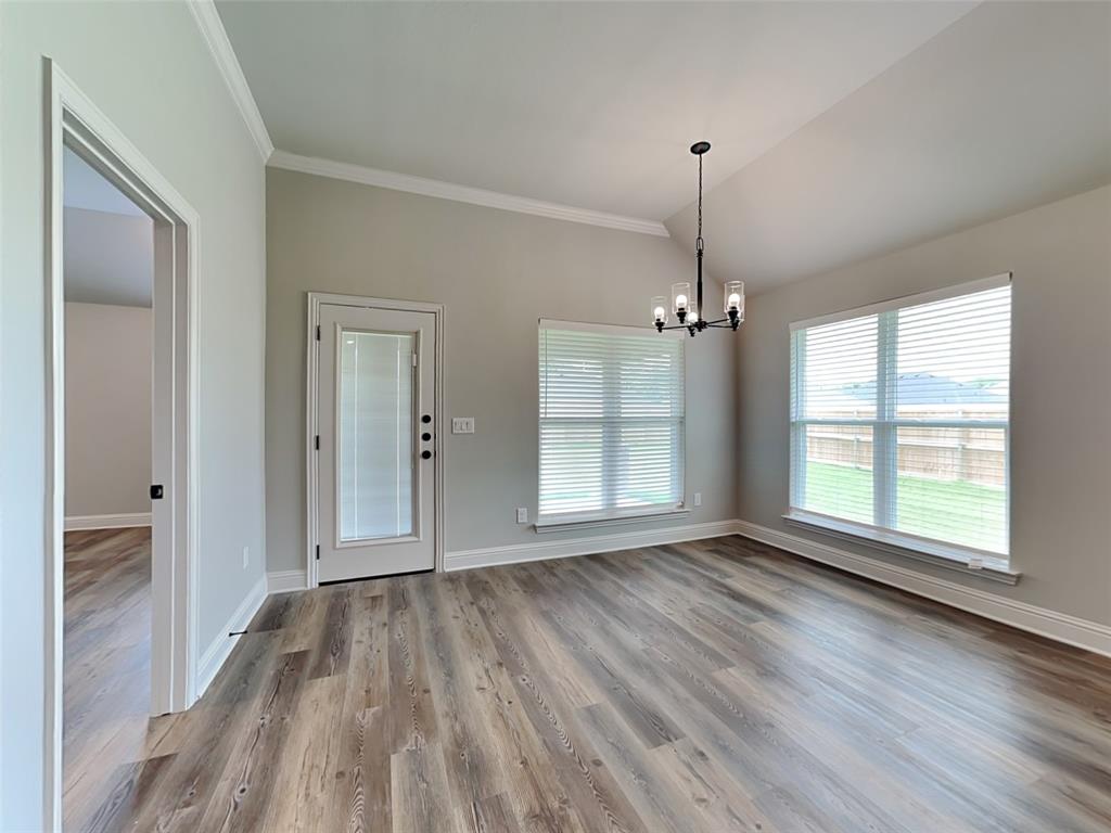 2108 Gabriel Drive Sherman, TX 75092 - Photo 5 of 16 a view of empty room with wooden floor and fan