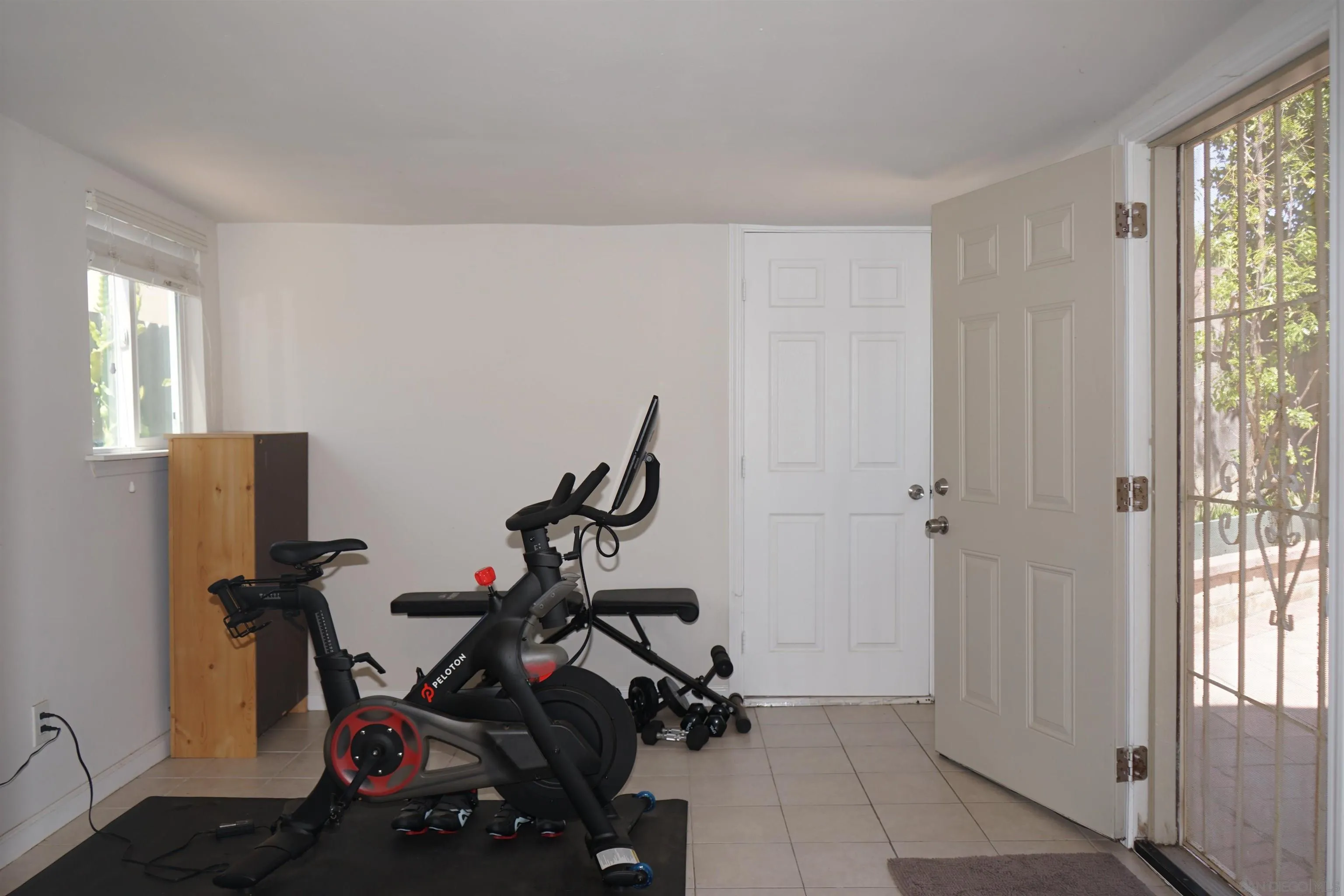 7842 Hemphill Drive San Diego, CA 92126 - Photo 14 of 29 a view of a room with gym equipment