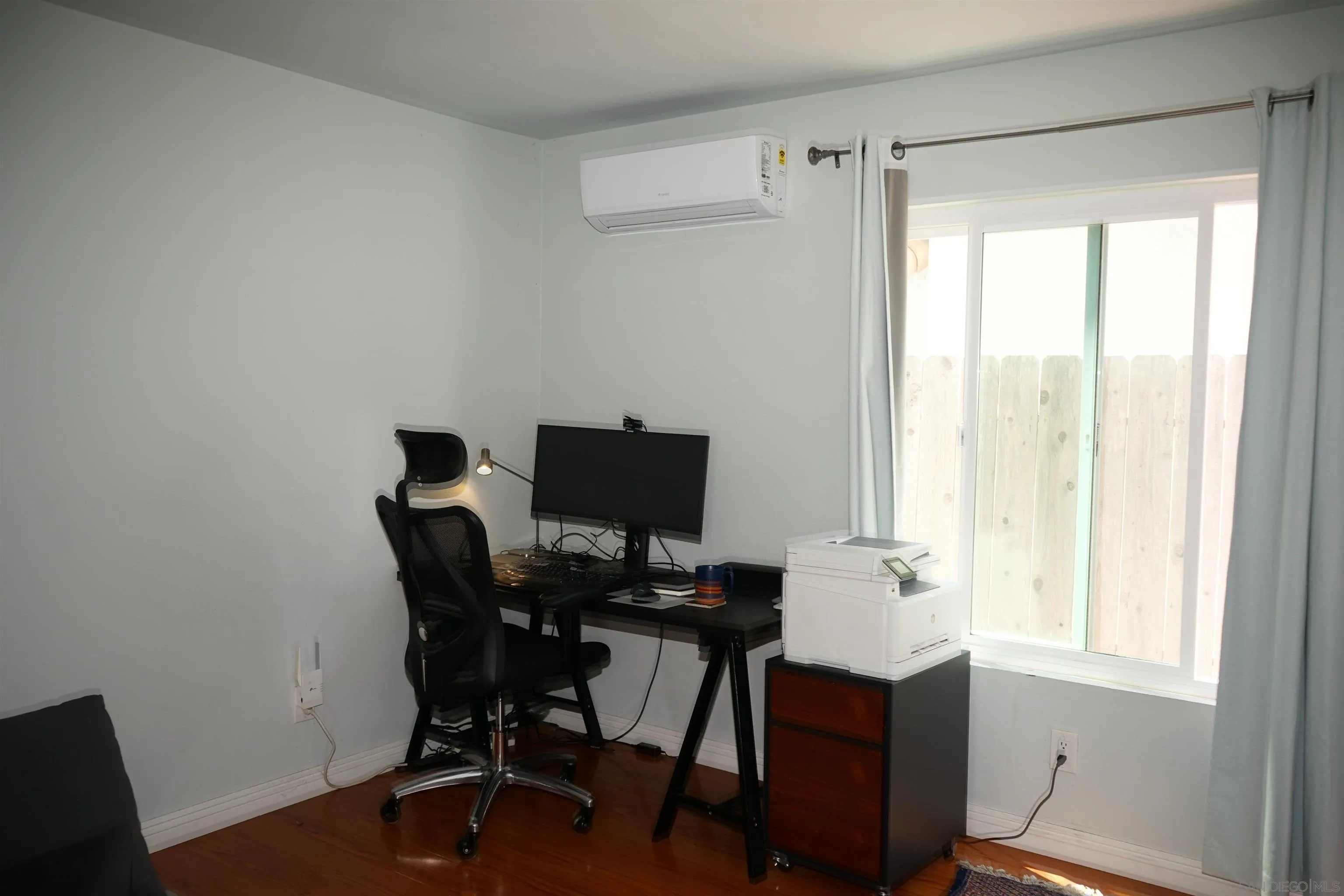 7842 Hemphill Drive San Diego, CA 92126 - Photo 18 of 29 a view of a workspace with furniture and a window