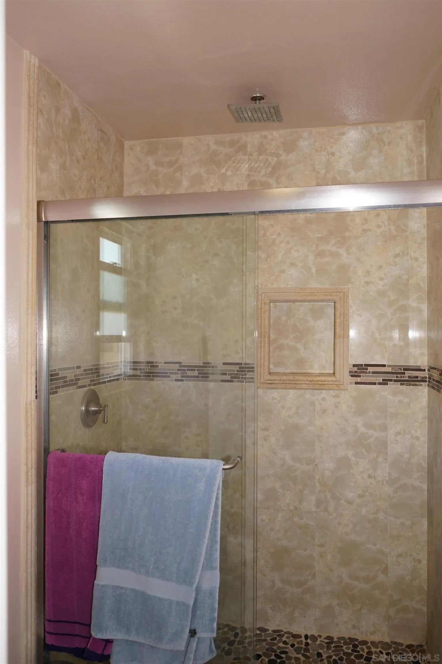 7842 Hemphill Drive San Diego, CA 92126 - Photo 27 of 29 a bathroom with a shower