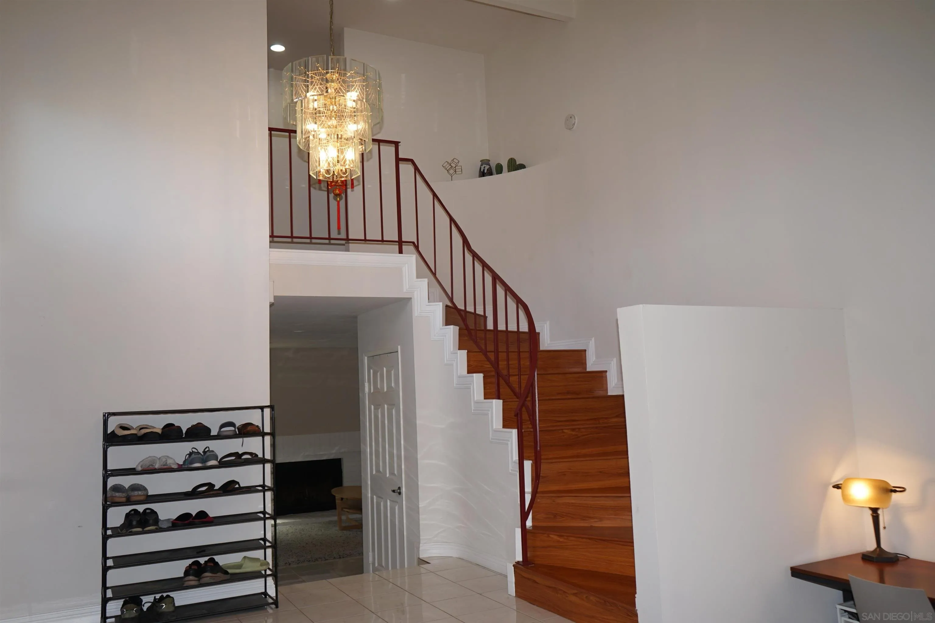 7842 Hemphill Drive San Diego, CA 92126 - Photo 5 of 29 a view of entryway and hall with wooden floor