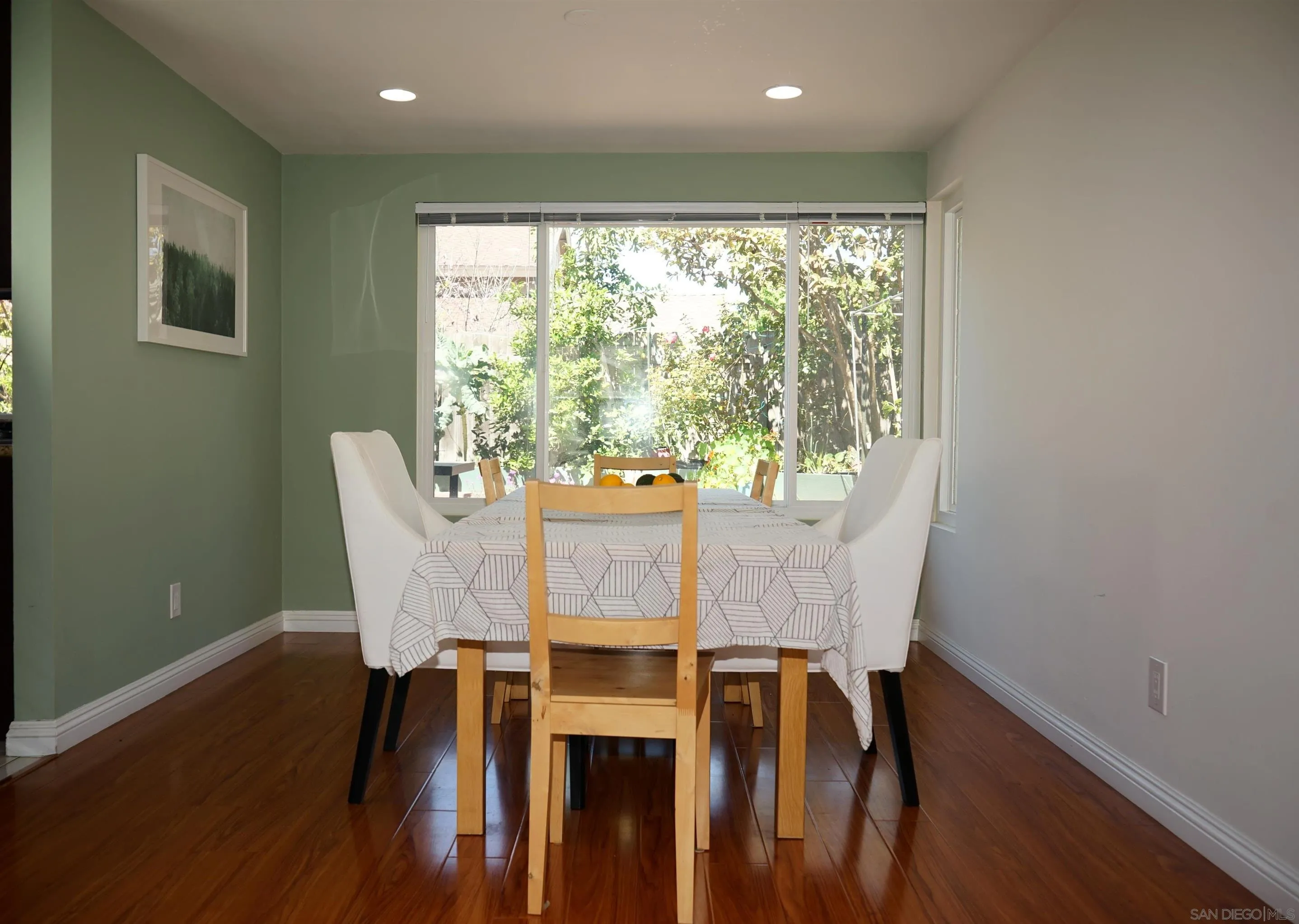 7842 Hemphill Drive San Diego, CA 92126 - Photo 9 of 29 a view of a dining room with furniture and wooden floor