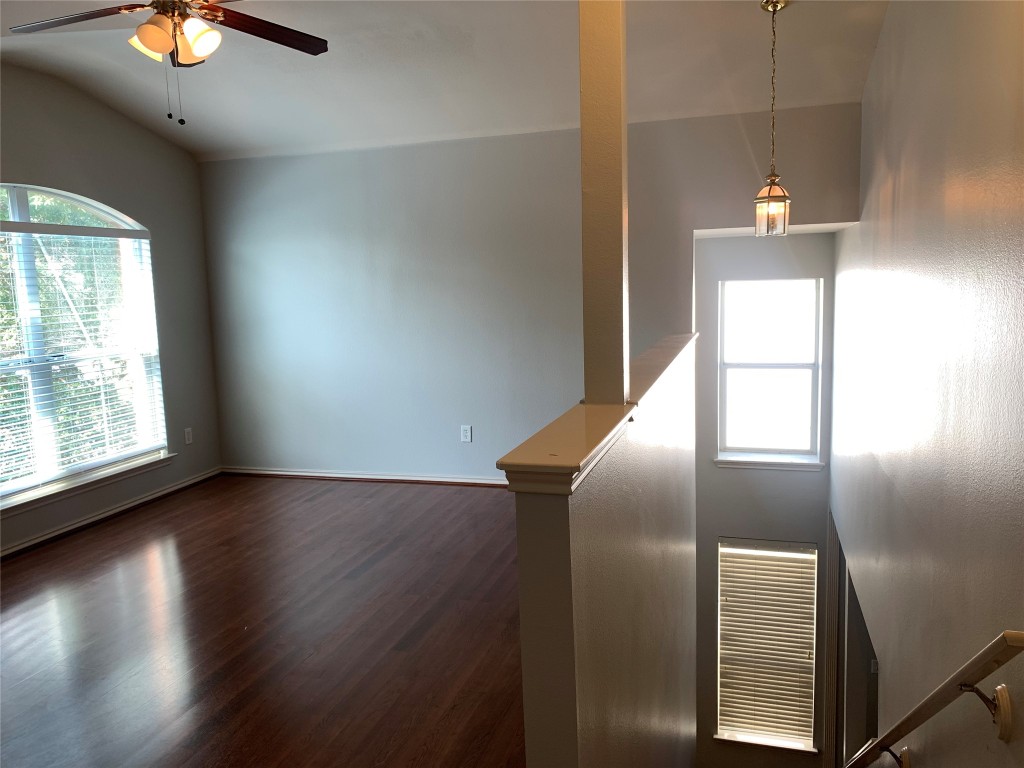 3667 Spring Canyon Trail Round Rock, TX 78681 - Photo 21 of 24 a view of a hallway with wooden floor