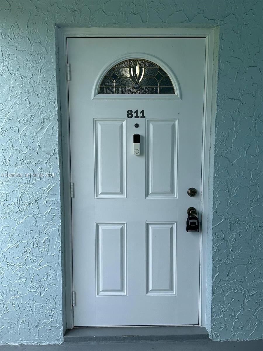 9848 Marina Boulevard, Unit 811 Boca Raton, FL 33428 - Photo 5 of 86 a close view of a door