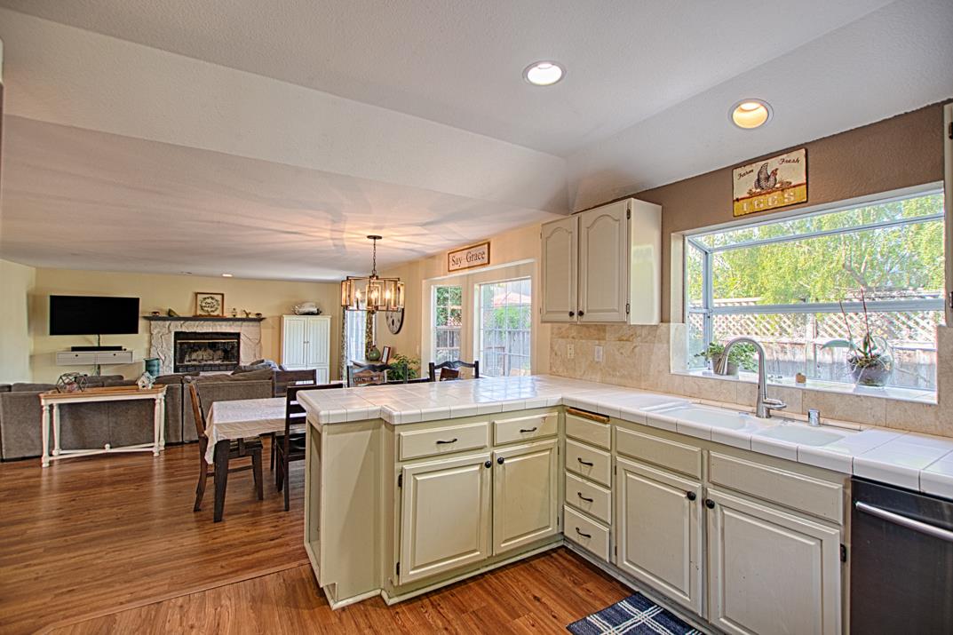 2230 Albert Lane Capitola, CA 95010 - Photo 13 of 34 a kitchen that has a lot of cabinets in it and appliances