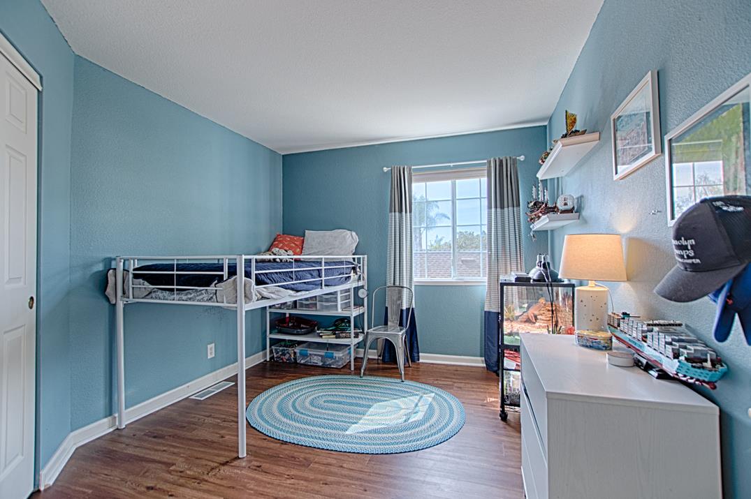 2230 Albert Lane Capitola, CA 95010 - Photo 20 of 34 a room with furniture and a wooden floor