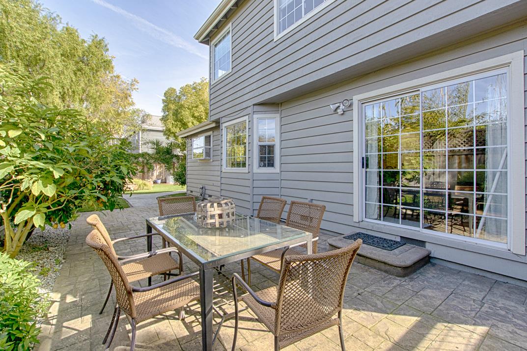 2230 Albert Lane Capitola, CA 95010 - Photo 27 of 34 a view of a patio with table and chairs and potted plants