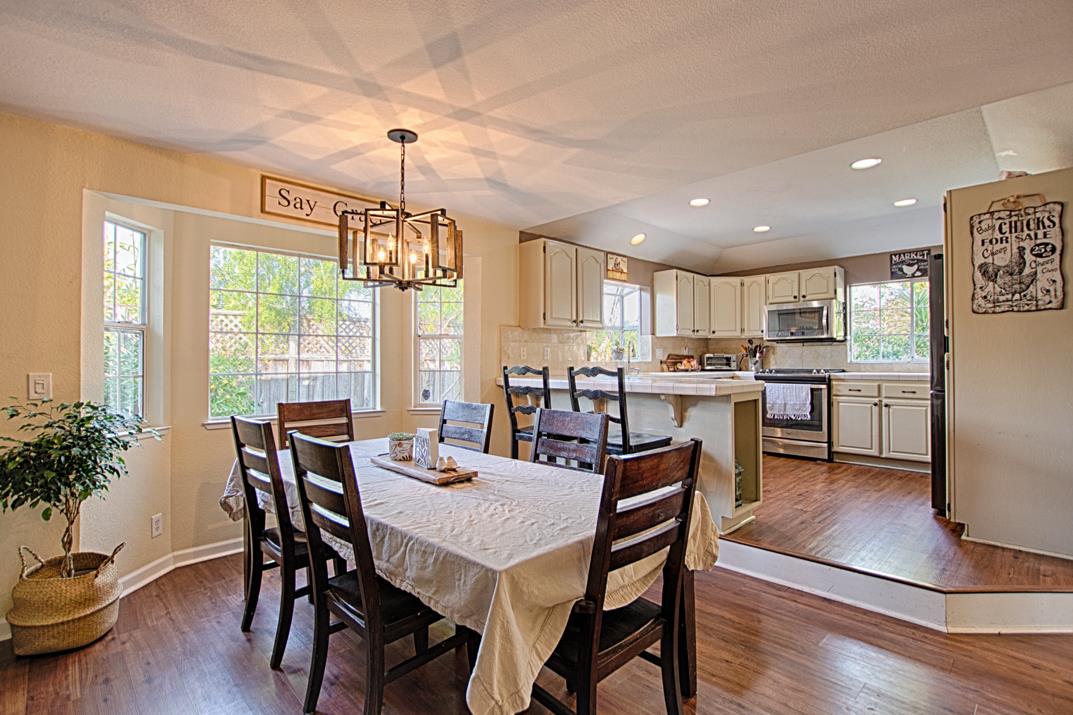 2230 Albert Lane Capitola, CA 95010 - Photo 9 of 34 a view of a dining room with furniture window and wooden floor