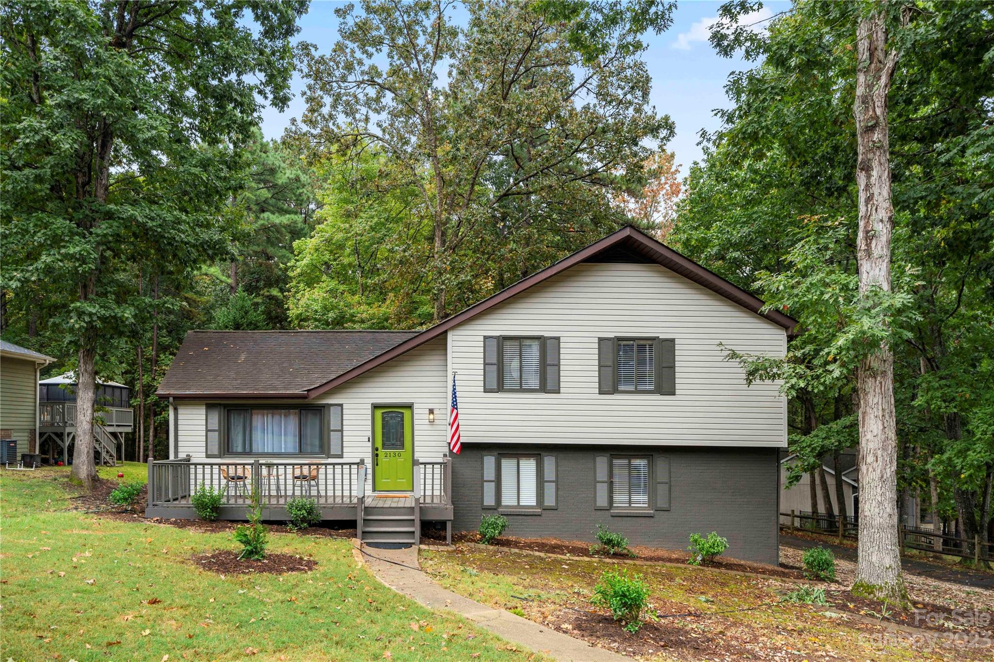 2130 Manawa Lane Tega Cay, SC 29708 - Photo 1 of 43 a front view of a house with a yard
