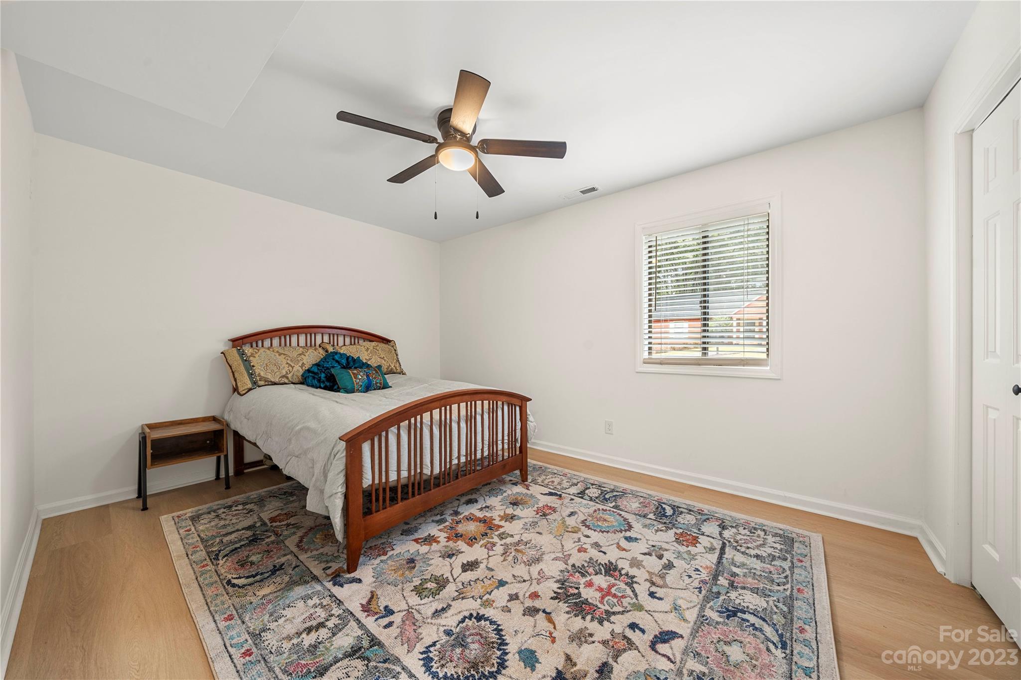 2130 Manawa Lane Tega Cay, SC 29708 - Photo 24 of 43 a bedroom with furniture and a window