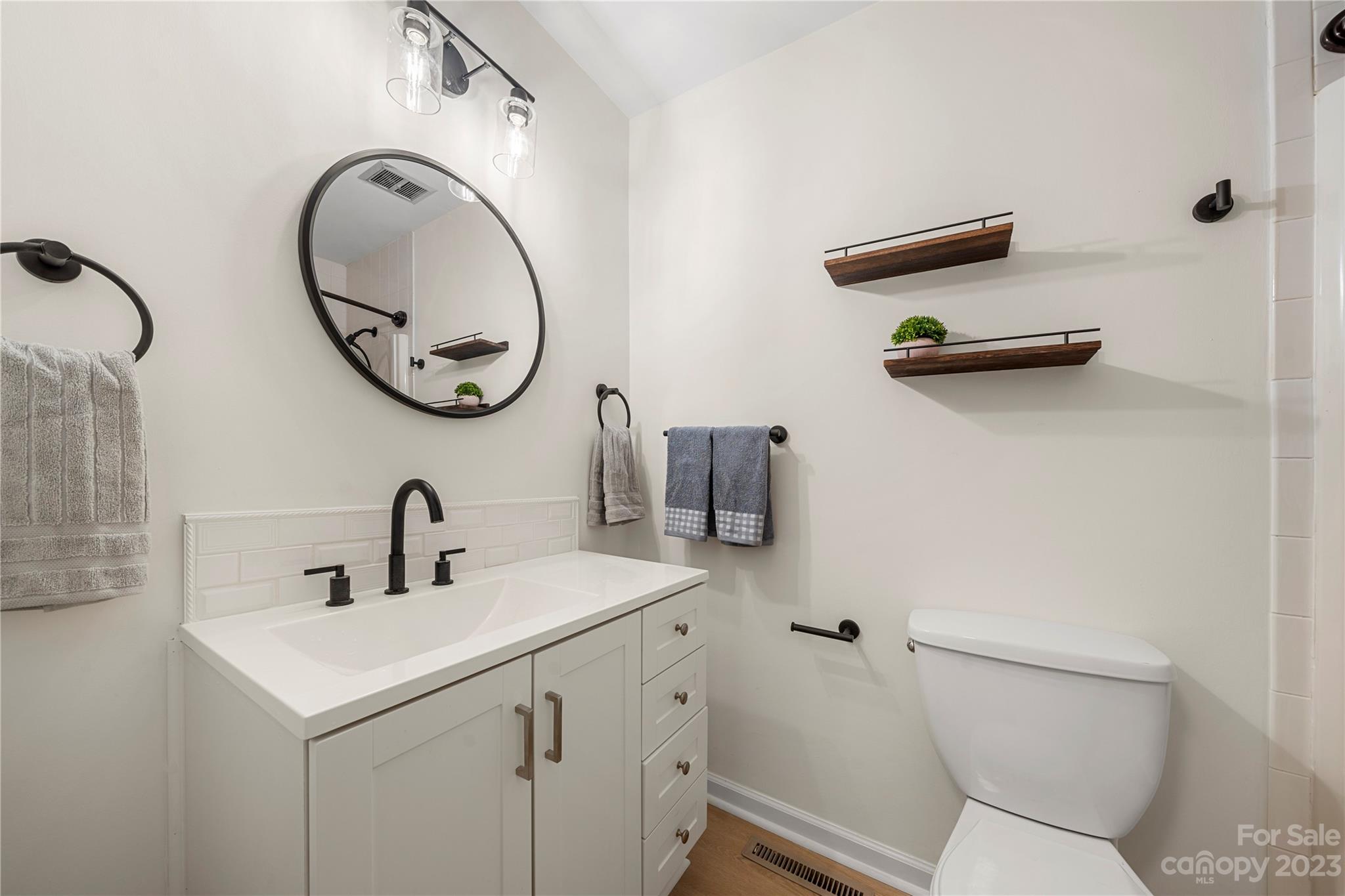 2130 Manawa Lane Tega Cay, SC 29708 - Photo 32 of 43 a bathroom with a toilet and a sink