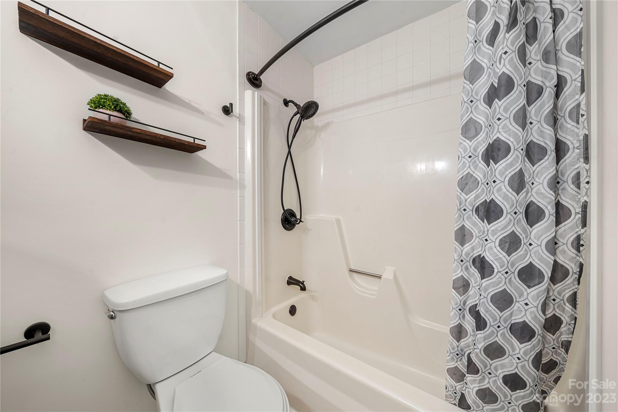 2130 Manawa Lane Tega Cay, SC 29708 - Photo 33 of 43 a bathroom with a toilet and a shower