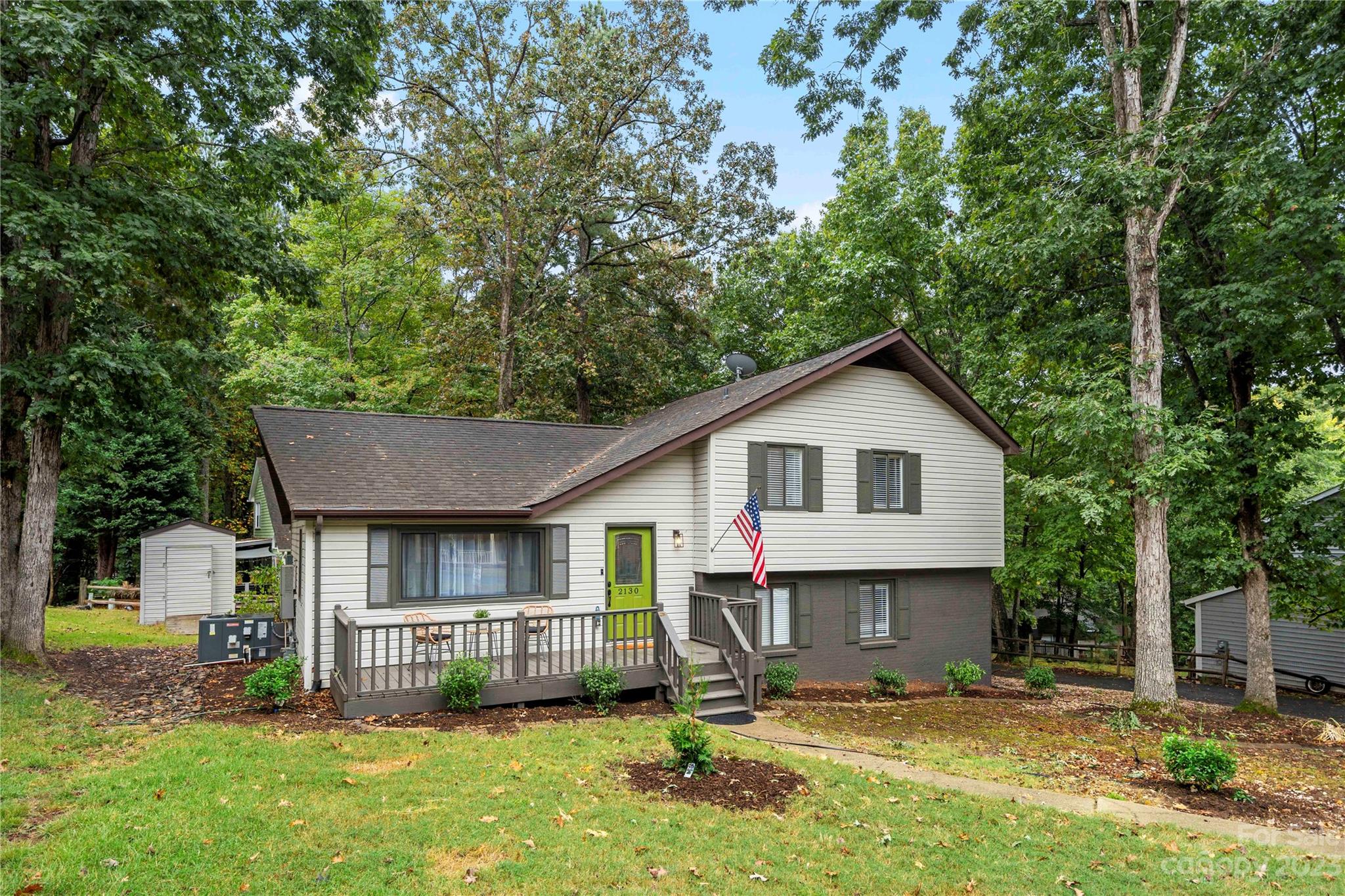 2130 Manawa Lane Tega Cay, SC 29708 - Photo 38 of 43 a view of a house with a yard and large trees