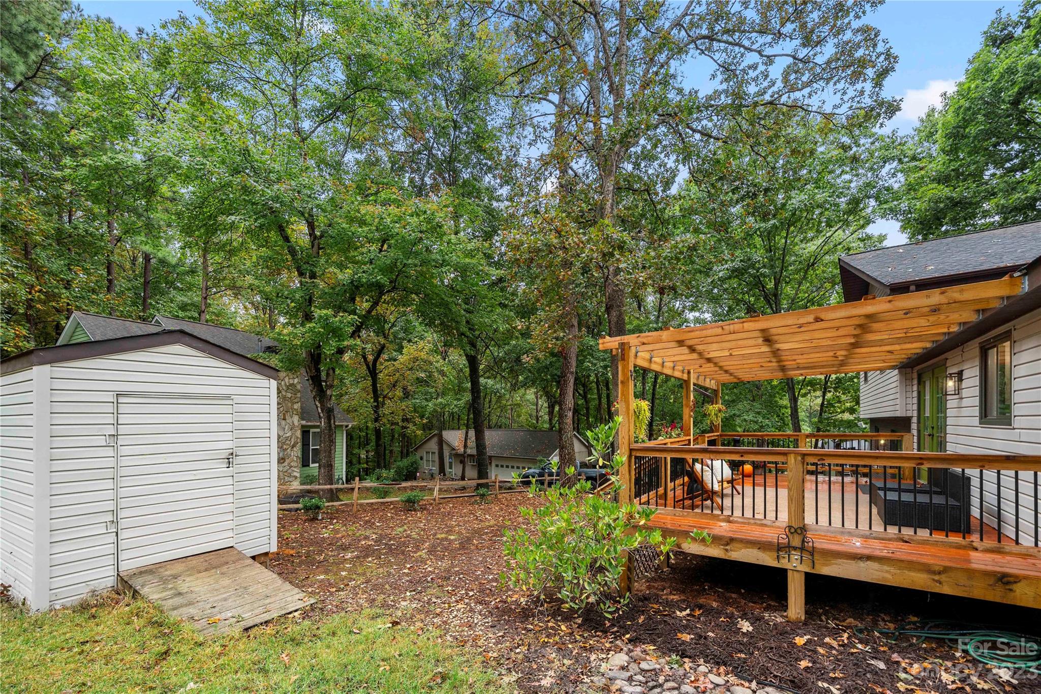 2130 Manawa Lane Tega Cay, SC 29708 - Photo 40 of 43 a view of a chair and table in the backyard