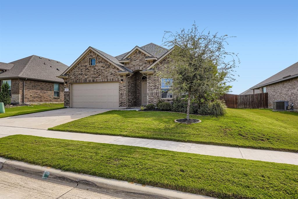 1829 Ruffian Road Granbury, TX 76049 - Photo 3 of 39 a view of a house with a yard and tree s