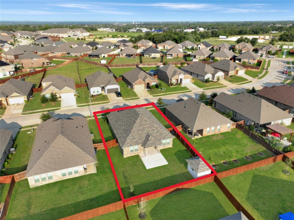 1829 Ruffian Road Granbury, TX 76049 - Photo 31 of 39 an aerial view of residential houses with outdoor space and pool