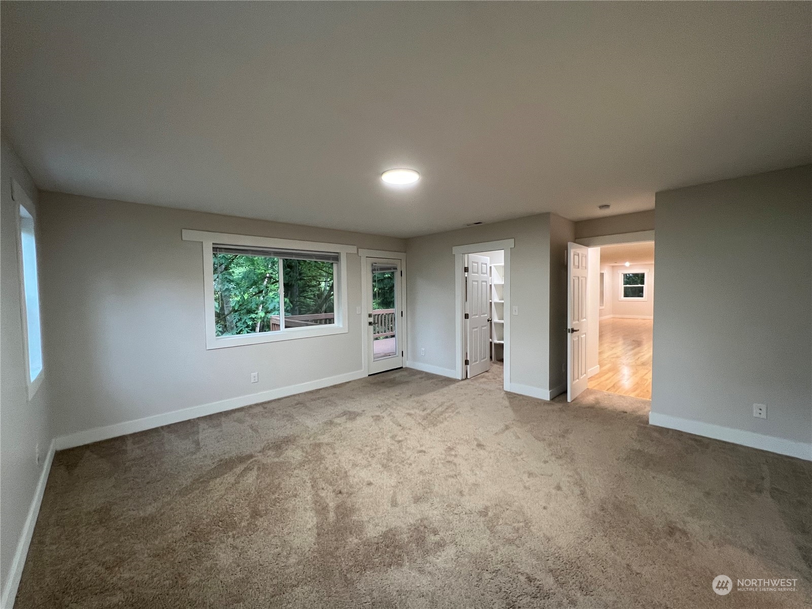 8229 South 132nd Street Seattle, WA 98178 - Photo 11 of 15 an empty room with windows and closet