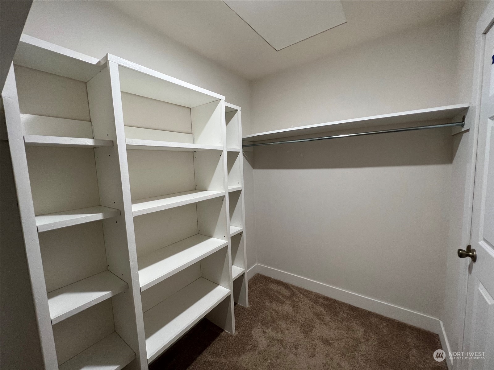 8229 South 132nd Street Seattle, WA 98178 - Photo 12 of 15 a view of an empty walk in closet