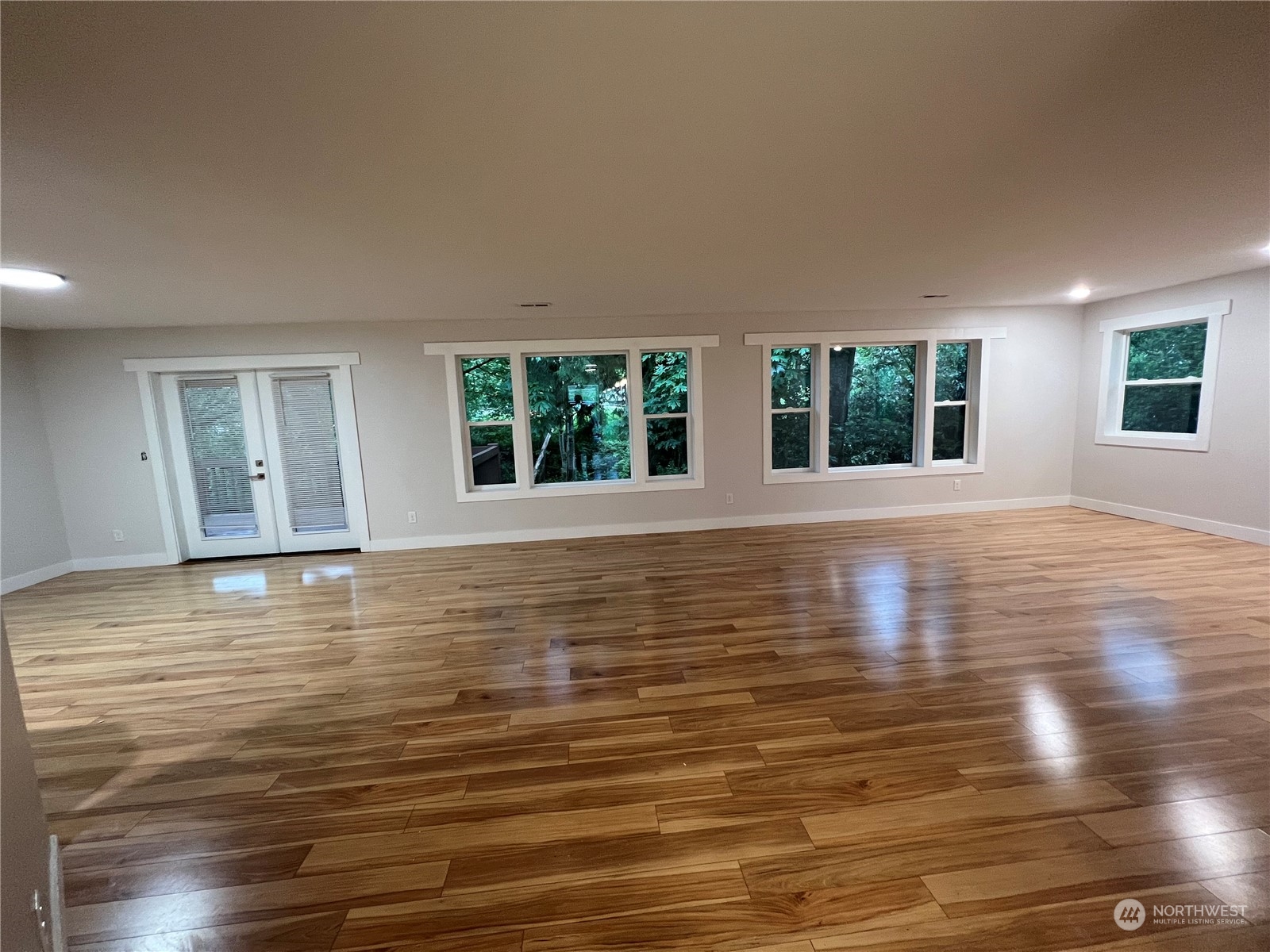 8229 South 132nd Street Seattle, WA 98178 - Photo 8 of 15 a view of a room with wooden floor and window