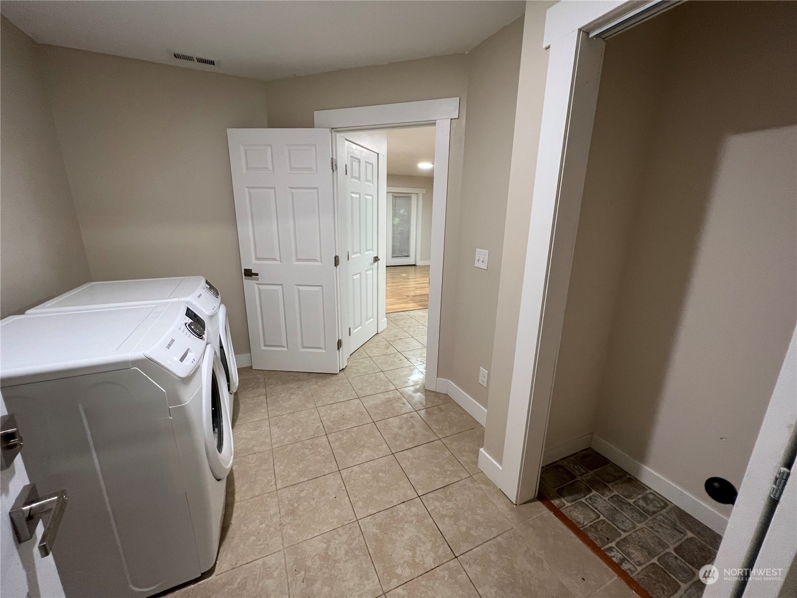 8229 South 132nd Street Seattle, WA 98178 - Photo 9 of 15 a view of a storage & utility room with a washer and dryer