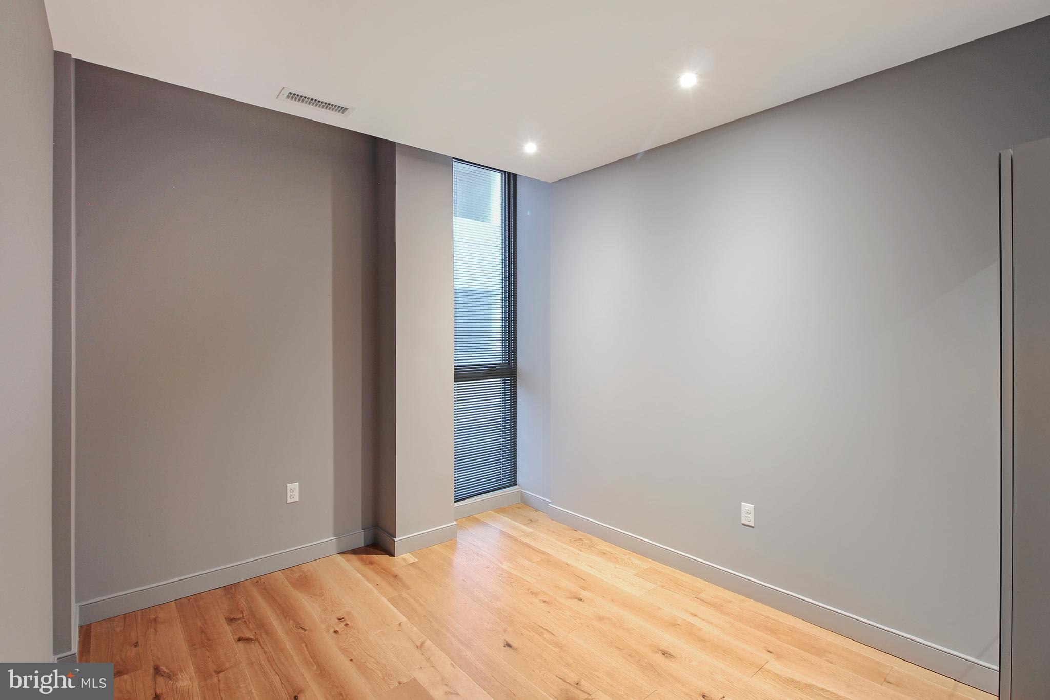 448 K Street Northwest, Unit 301 Washington, DC 20001 - Photo 19 of 25 a view of an empty room