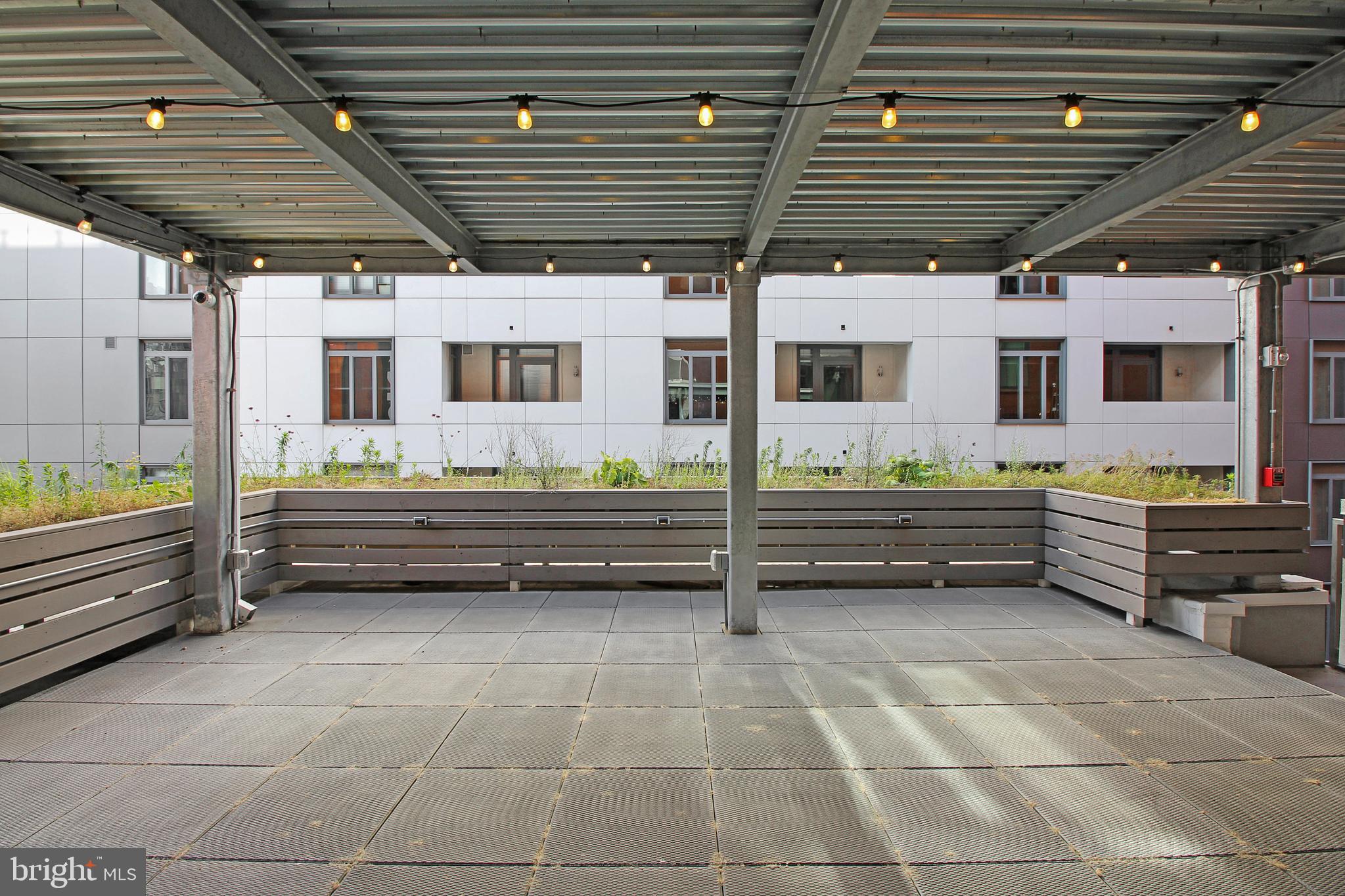 448 K Street Northwest, Unit 301 Washington, DC 20001 - Photo 25 of 25 a room with natural light and wooden floor