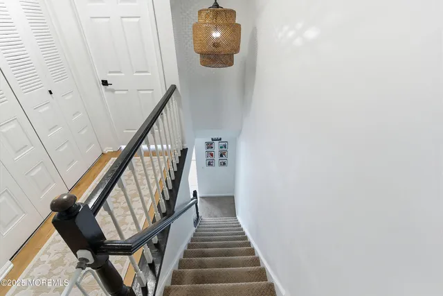 a view of a hallway with windows