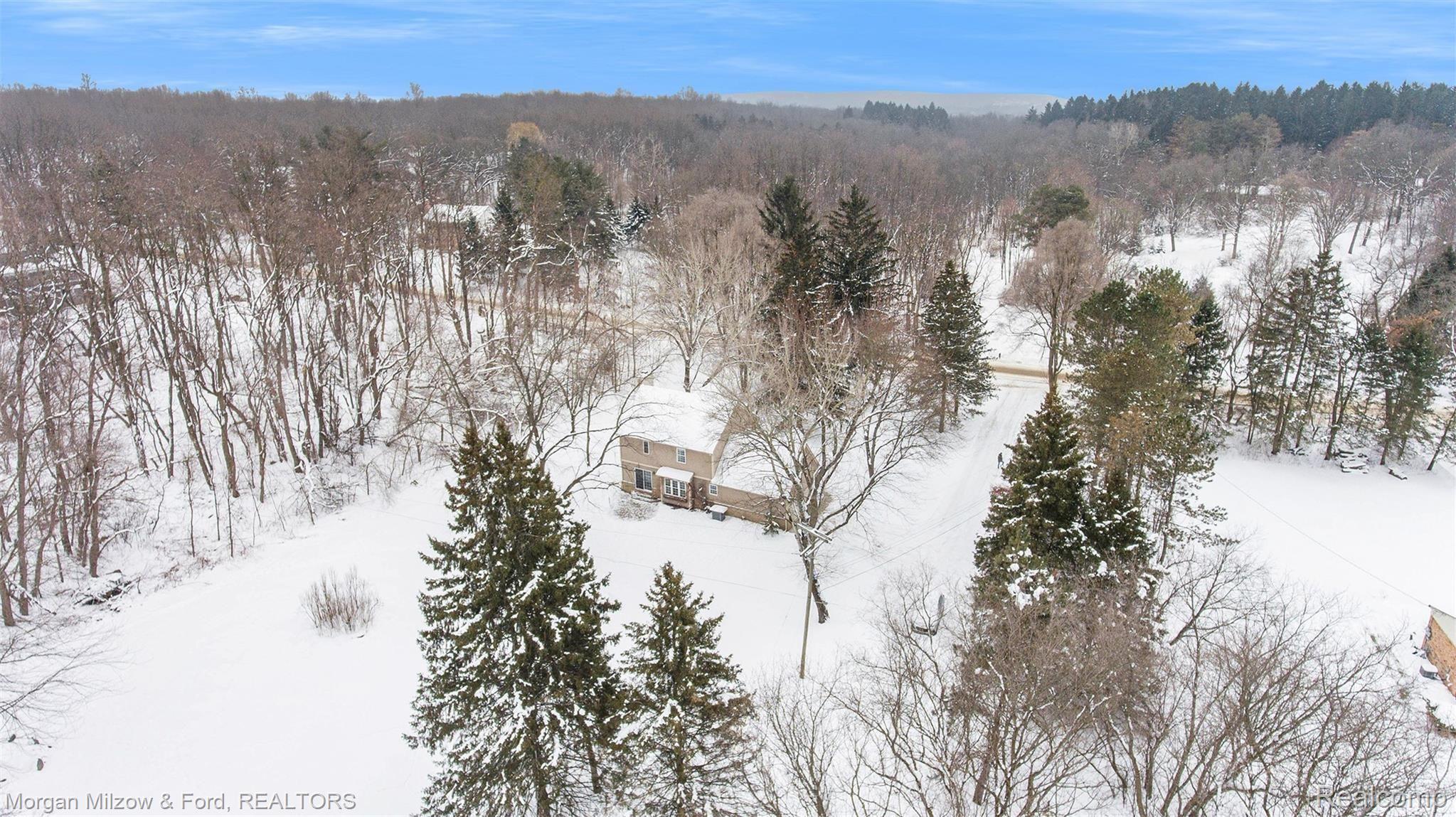 9380 Rattalee Lake Road Clarkston, MI 48348 - Photo 24 of 35 Perfectly poised on over 2 acres