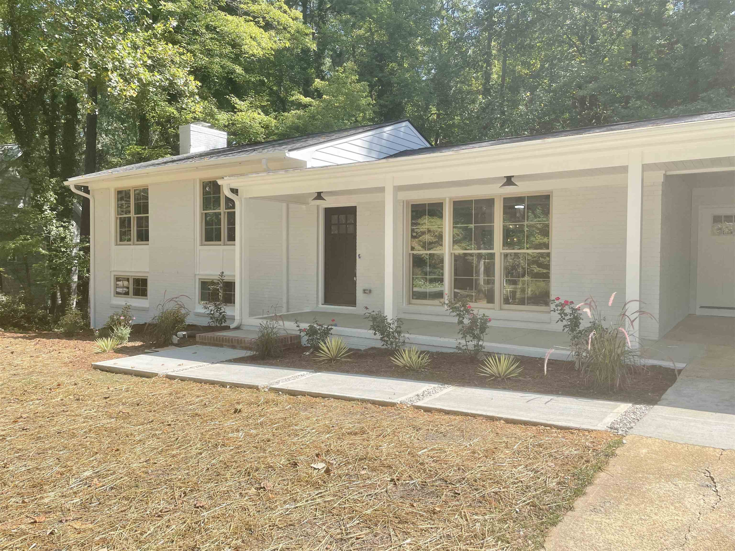 245 Marilyn Circle Cary, NC 27513 - Photo 3 of 21 a view of a house with backyard and sitting area