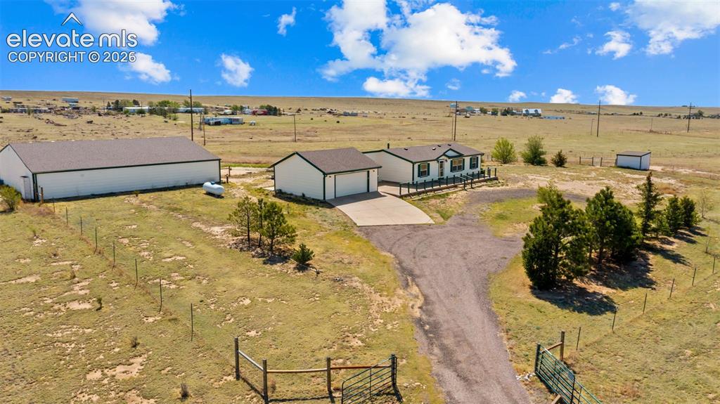 33975 Highway 94 Yoder, CO 80864 - Photo 28 of 40 Expansive property featuring a residence, detached garage, and large auxiliary building