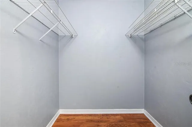 a view of a room with racks on the wall