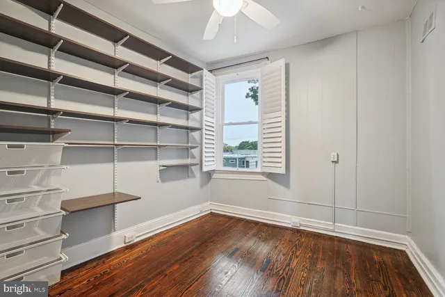 a view of a room with racks on the wall