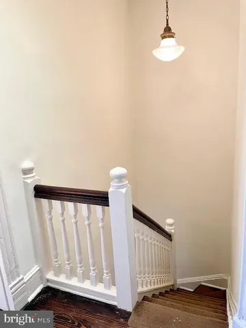 a view of entryway with wooden floor