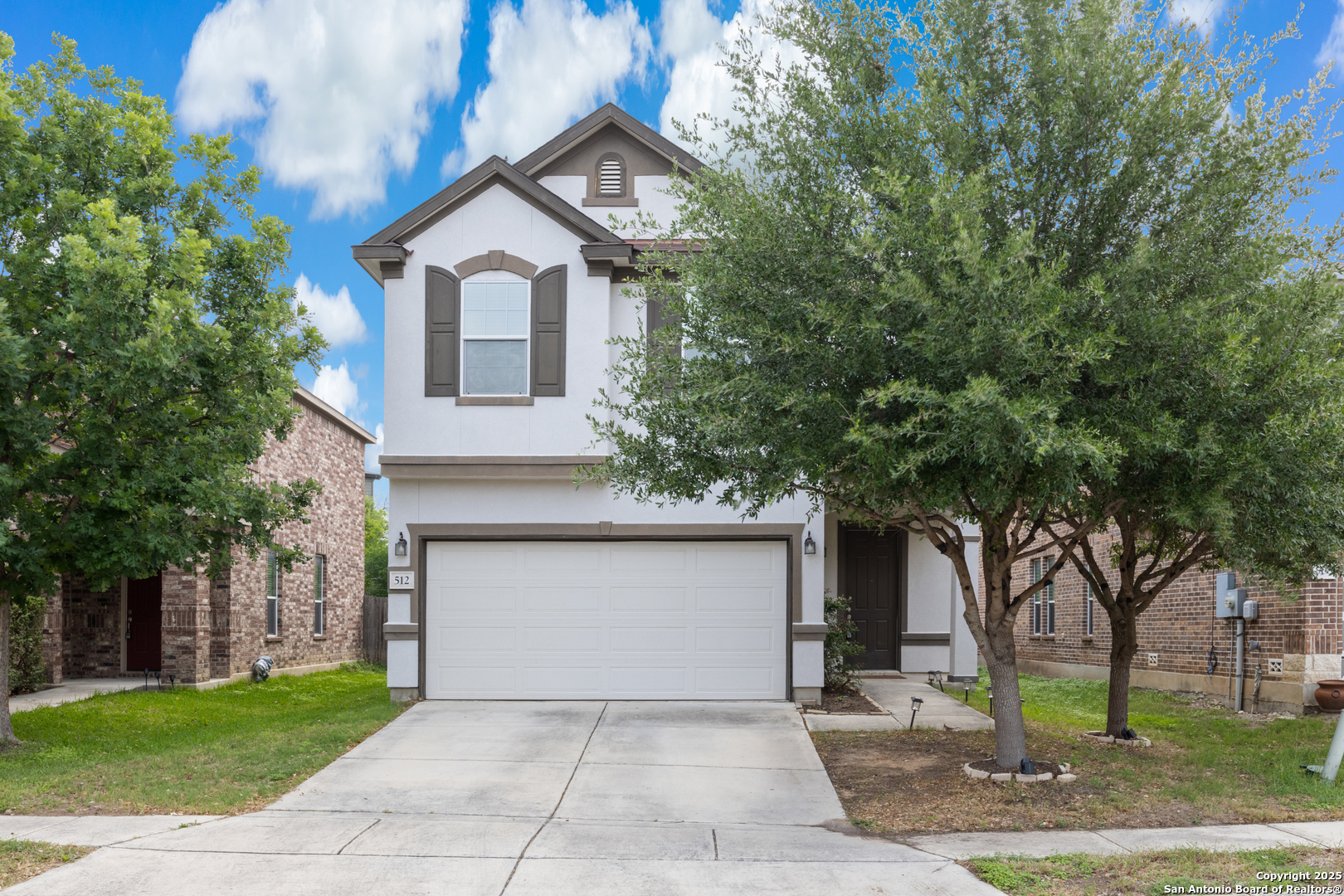 512 Granite Mist Universal City, TX 78148 - Photo 1 of 16 a front view of a house with a garden