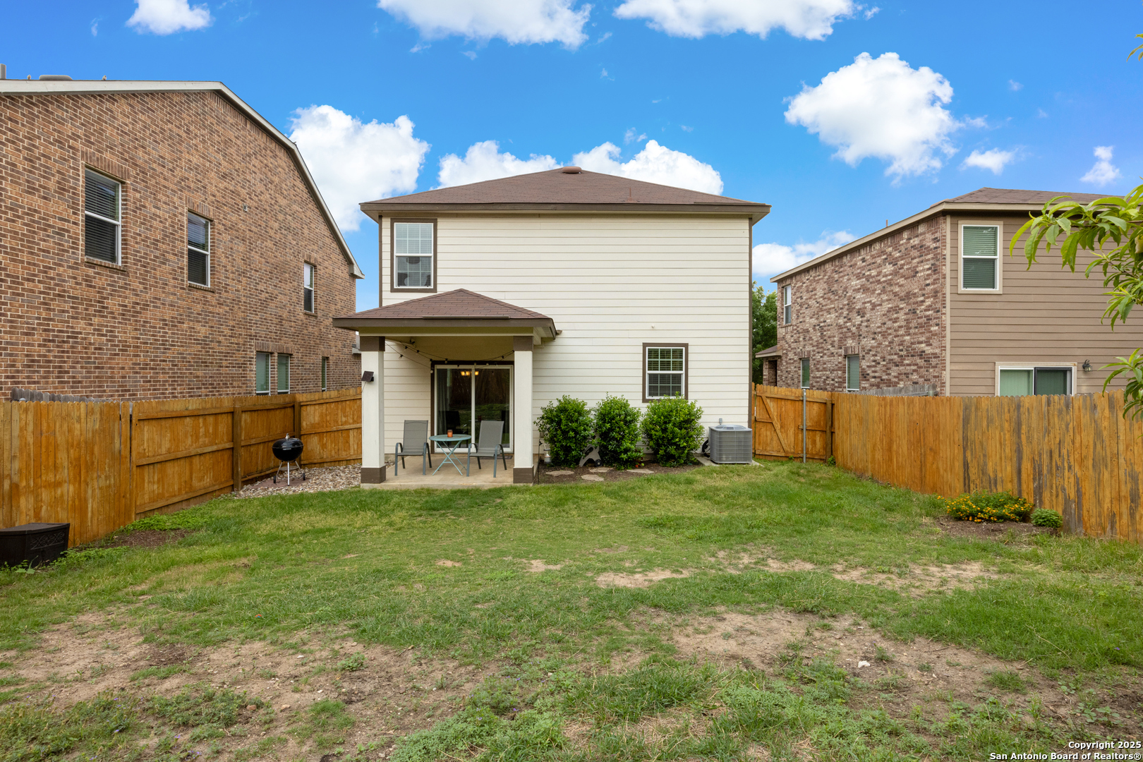 512 Granite Mist Universal City, TX 78148 - Photo 15 of 16 a view of a house with a yard