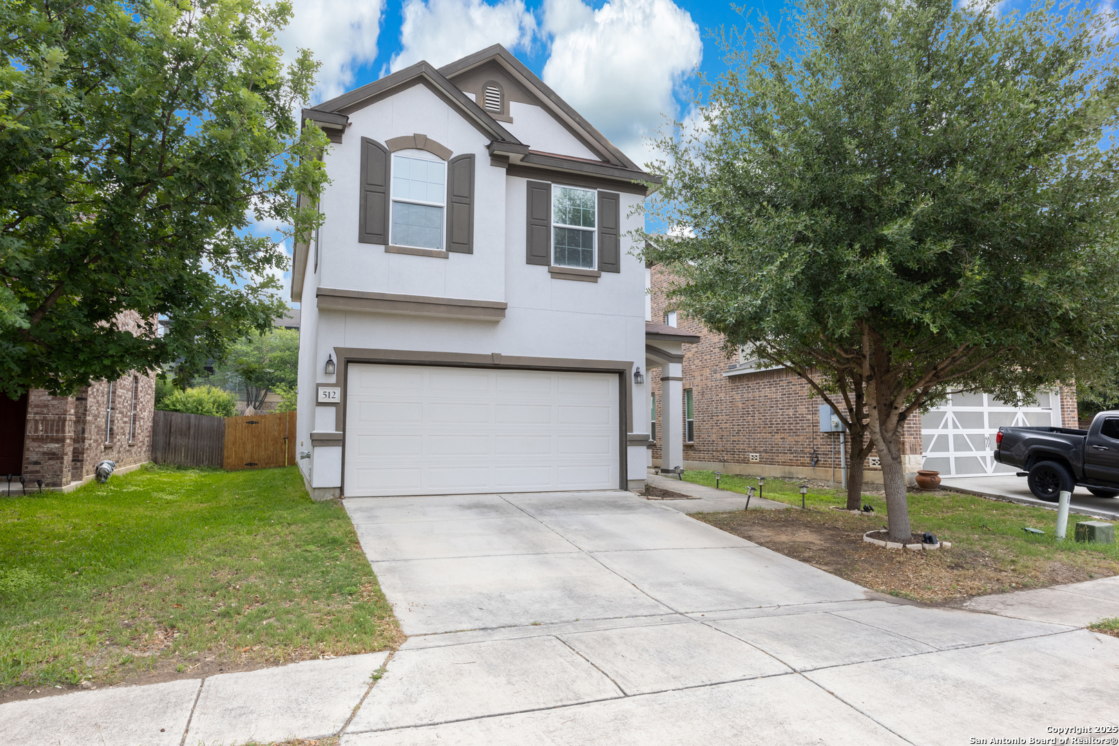 512 Granite Mist Universal City, TX 78148 - Photo 2 of 16 a house that has a tree in front of the house