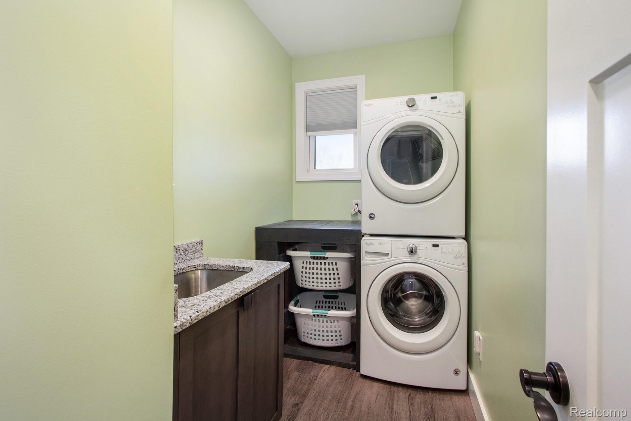 2086 Palms Road Columbus, MI 48063 - Photo 22 of 31 Laundry Room with Stackable Washer and Dryer