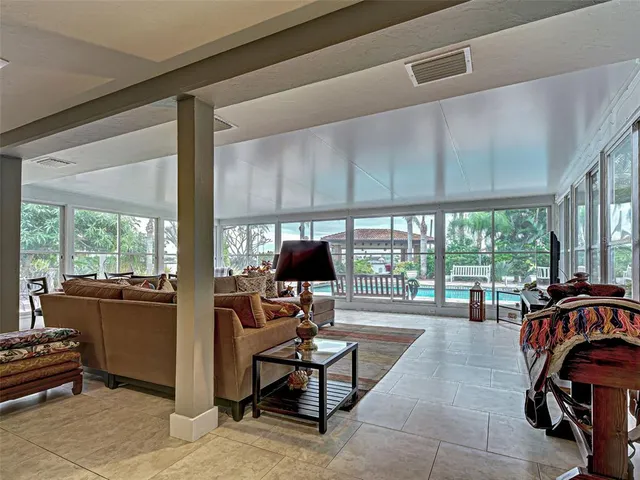 a bed room with a bed and a chandelier