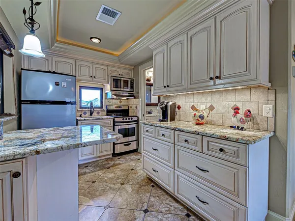 $1,399,000 | 107 Free Court Southeast, Port Charlotte, FL 33952