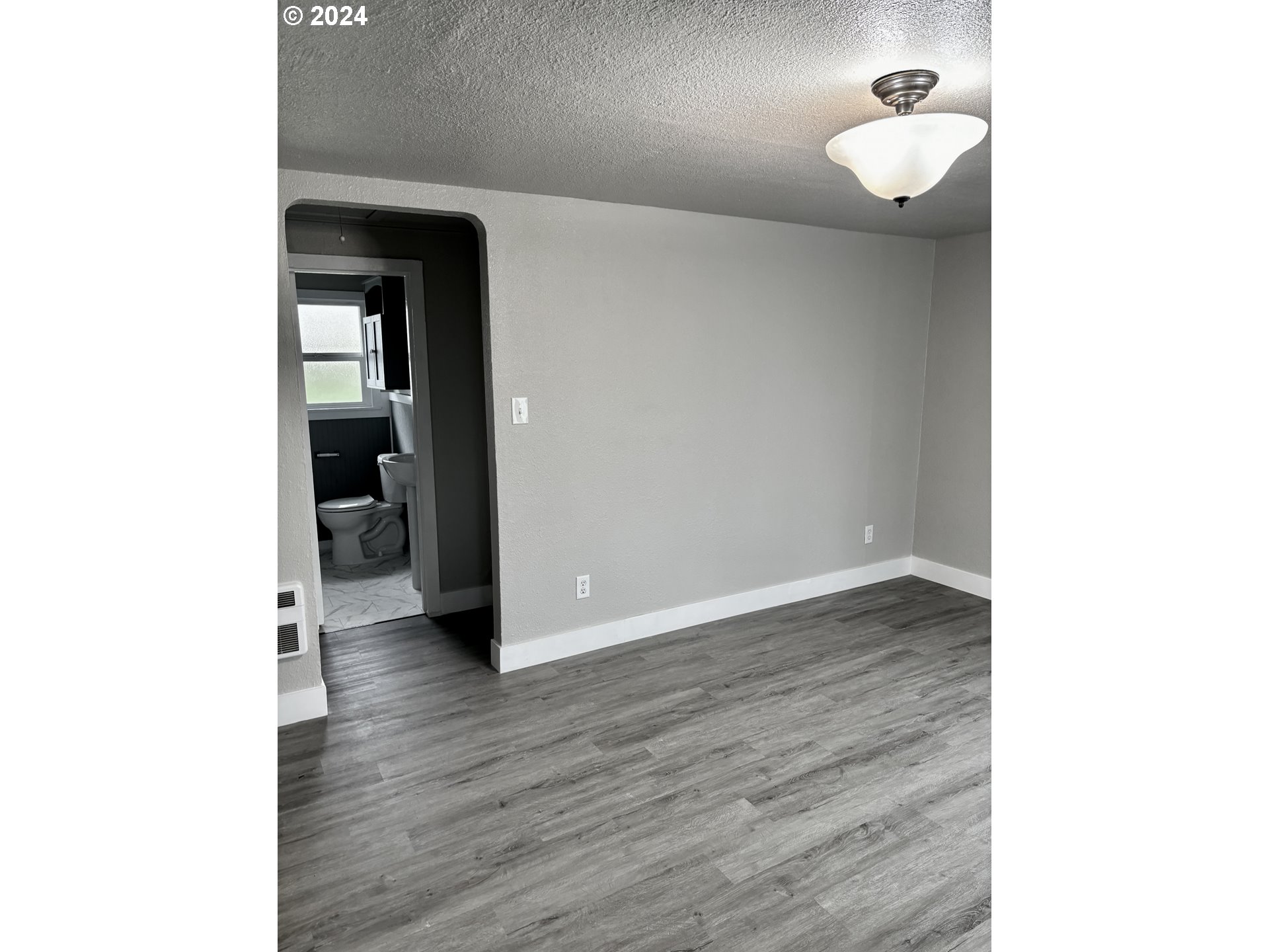 545 22nd Street Springfield, OR 97477 - Photo 9 of 25 a view of a room with wooden floor