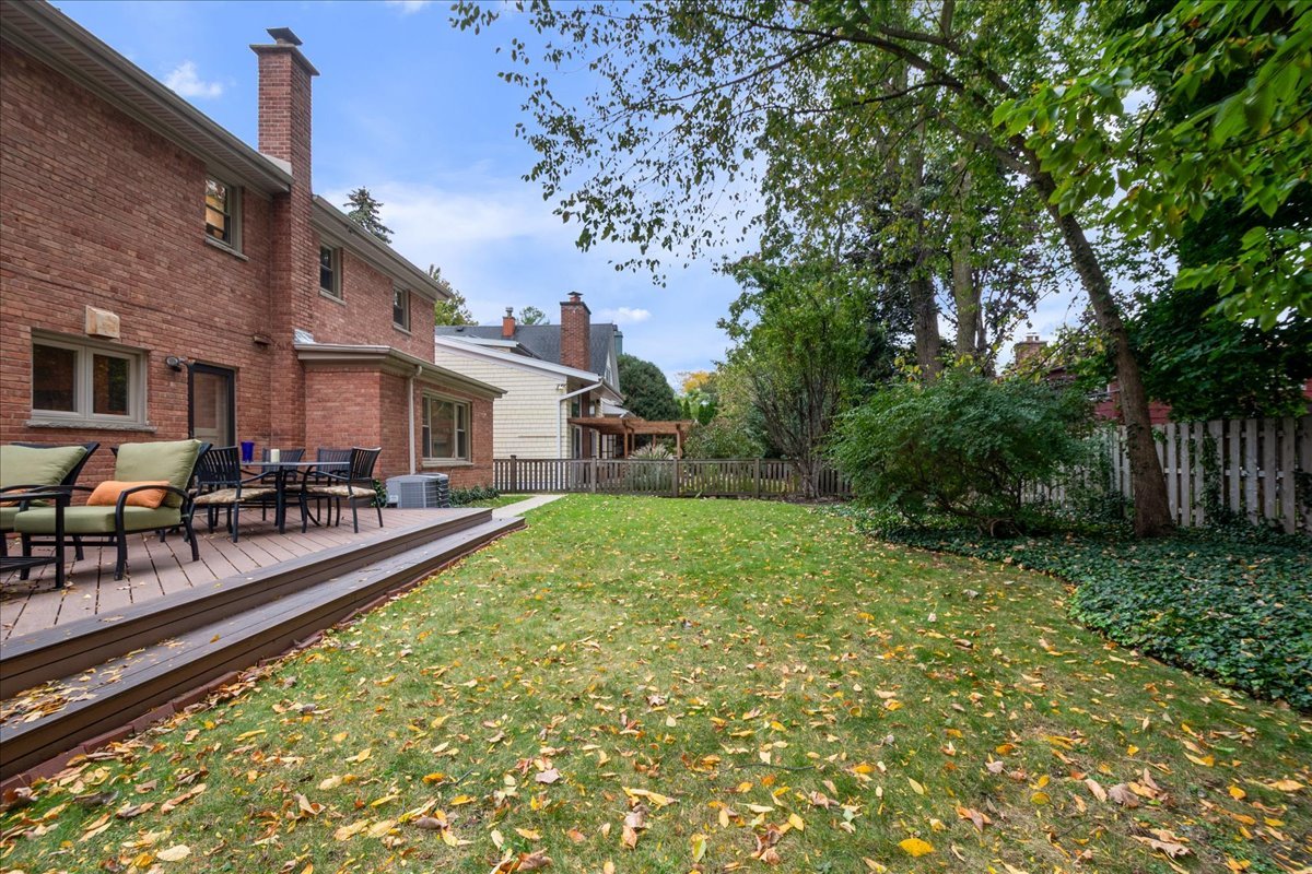 2440 Simpson Street Evanston, IL 60201 - Photo 33 of 34 a view of a house with backyard porch and sitting area
