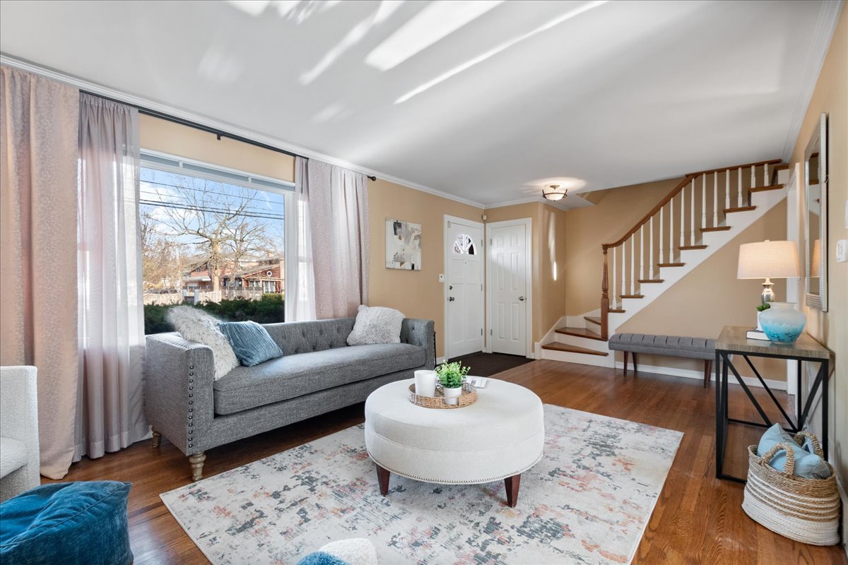 2440 Simpson Street Evanston, IL 60201 - Photo 6 of 34 a living room with furniture and a large window