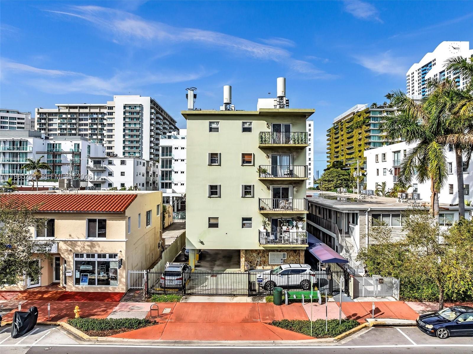 1236 Alton Road, Unit 304 Miami Beach, FL 33139 - Photo 24 of 28 a front view of a building with street view