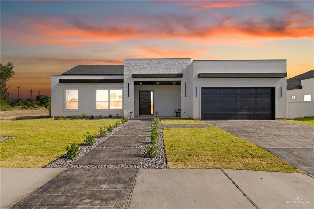 a view of a house with swimming pool
