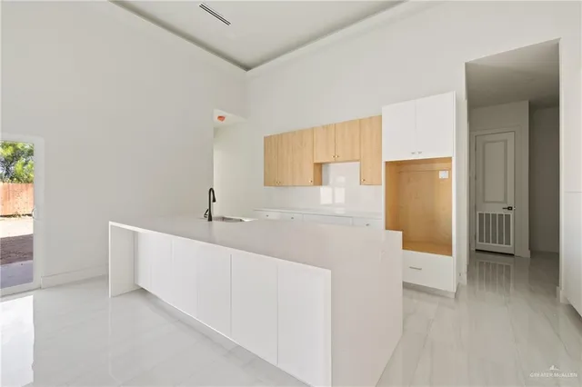 a view of an empty walk in closet