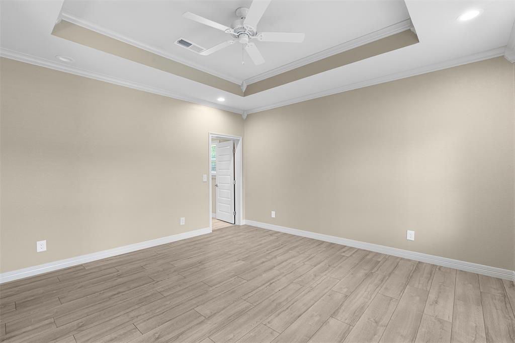 1011 Southeast County Road Corsicana, TX 75109 - Photo 17 of 40 wooden floor in an empty room