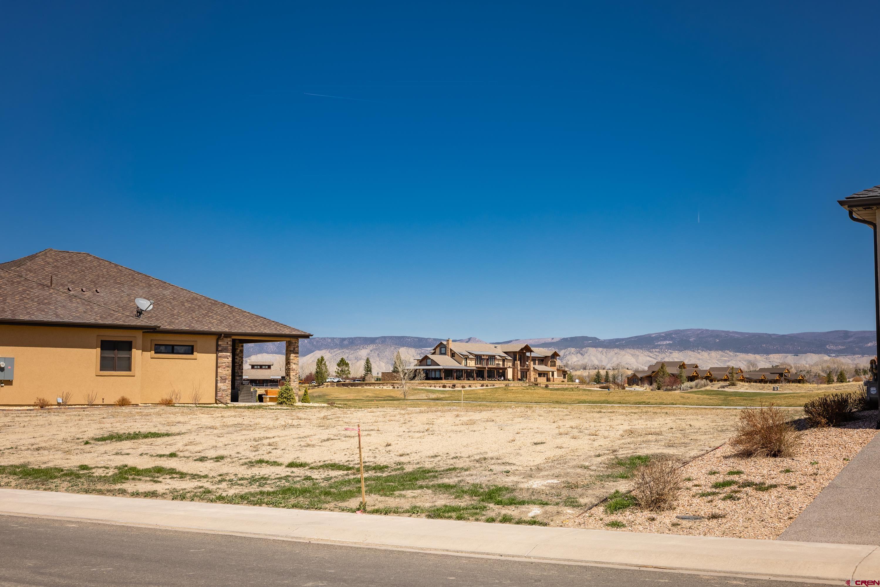 Lot 1928 Sleeping Bear Road Montrose, CO 81401 - Photo 6 of 12 a view of a house with lake view